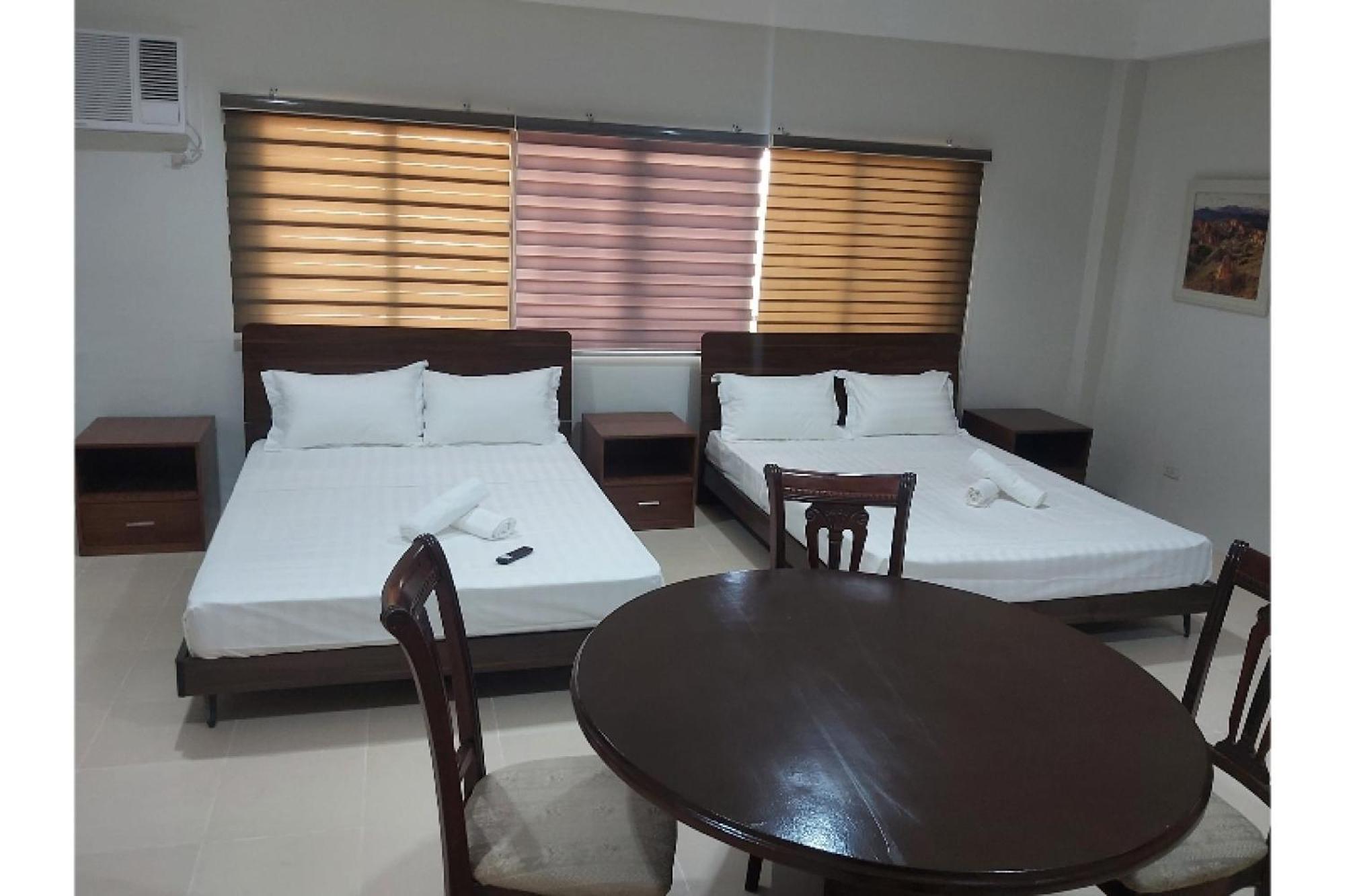 קואזון סיטי Nest Suites מראה חיצוני תמונה